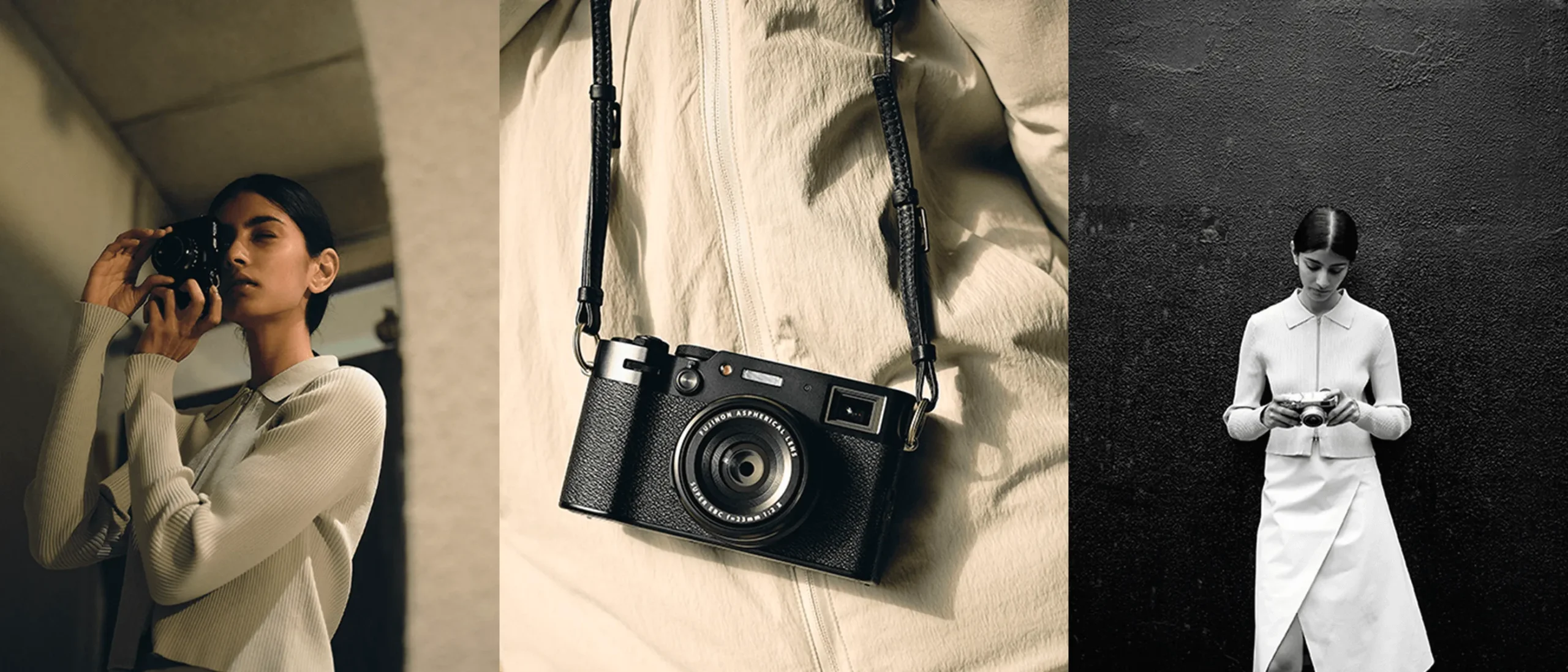 Image 1: A person is focused on taking a photograph, looking through the viewfinder of a Fujifilm X100VI. They are wearing a white ribbed top with a collar, adding a touch of elegance to the act of photography.Image 2: A Fujifilm X100VI with a textured grip and a leather strap is displayed against a neutral-toned fabric, highlighting the camera's design and craftsmanship. Image 3: A monochromatic image featuring a person dressed in a tailored white dress with a collar, standing against a textured dark wall, engrossed in examining a Fujifilm X100VI in their hands.